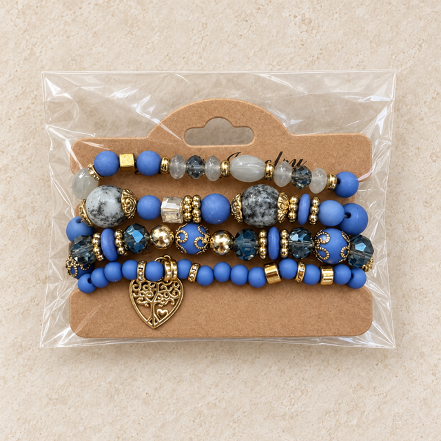Blauwe kralenarmbandenset met levensboomhart