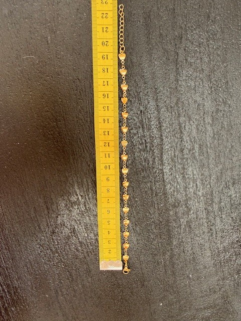 Goudkleurige hartjes armband