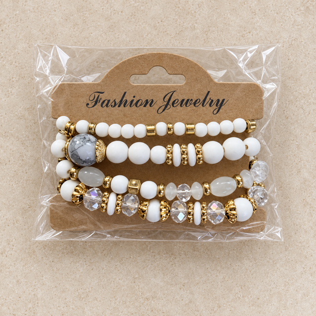 Witte Kralenarmbandenset met Goudkleurige Details
